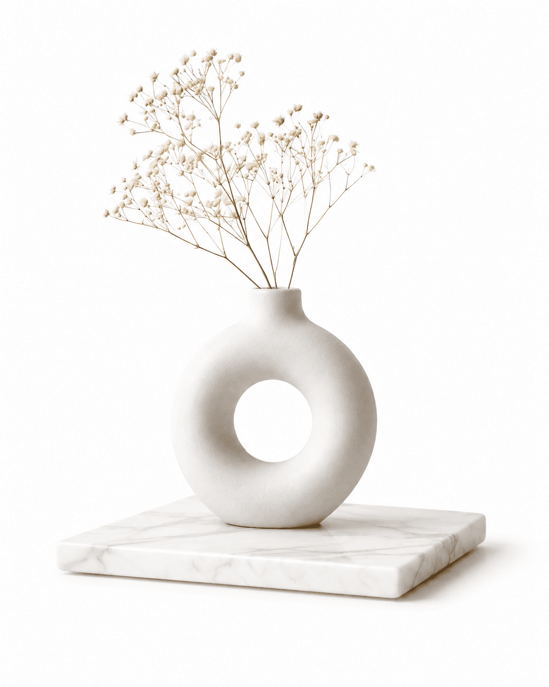 Minimalist vase with dried flowers on marble